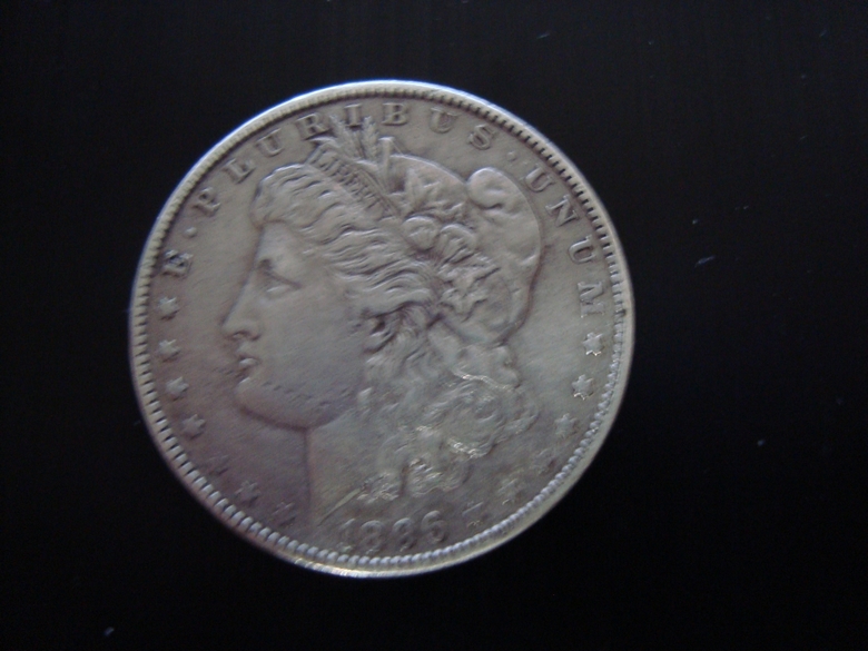 1896-Silver-Dollar-With-Mark-On-The-Face.